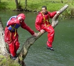 river hiking fully clothed