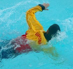 pool lifeguard swimming in uniform clothes